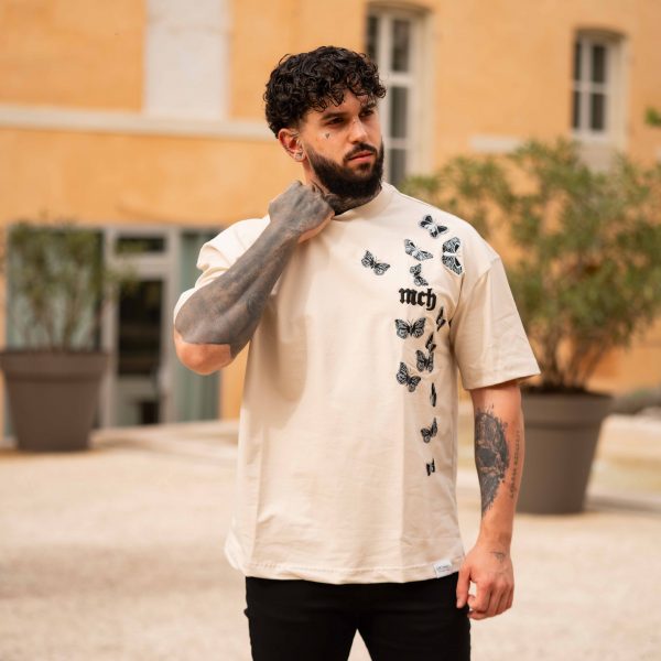 T-shirt Beige "Rise Against Odds" avec Motifs de Papillons
